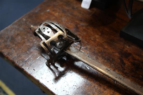 An 18th century Scottish basket hilted backsword,